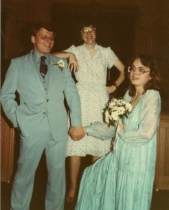 Julia with the bride and groom